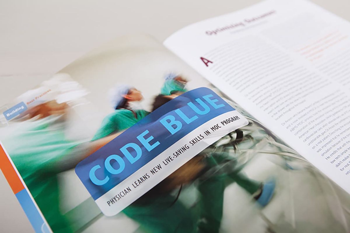 An open copy of the annual report with the headline Code Blue