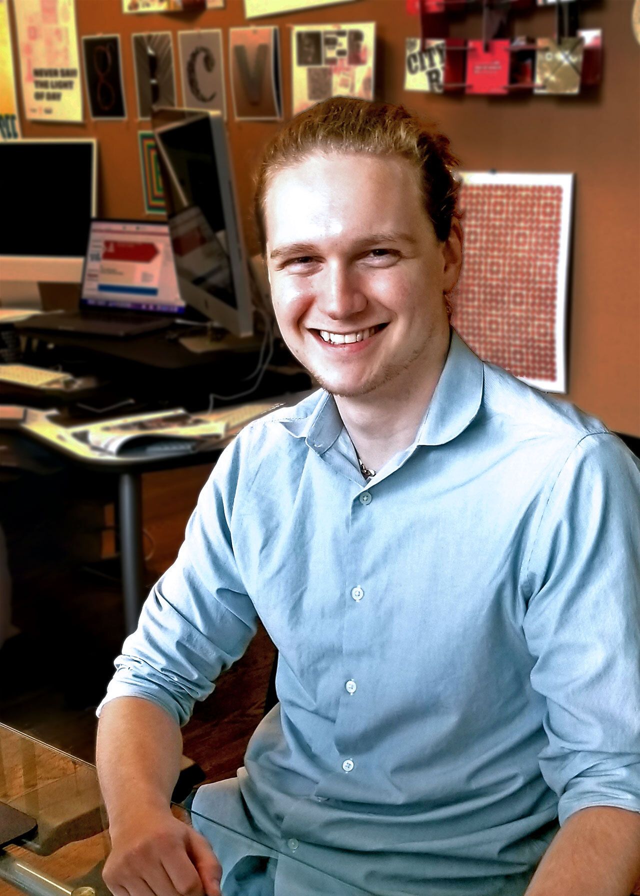 picture of grady sitting down at a desk